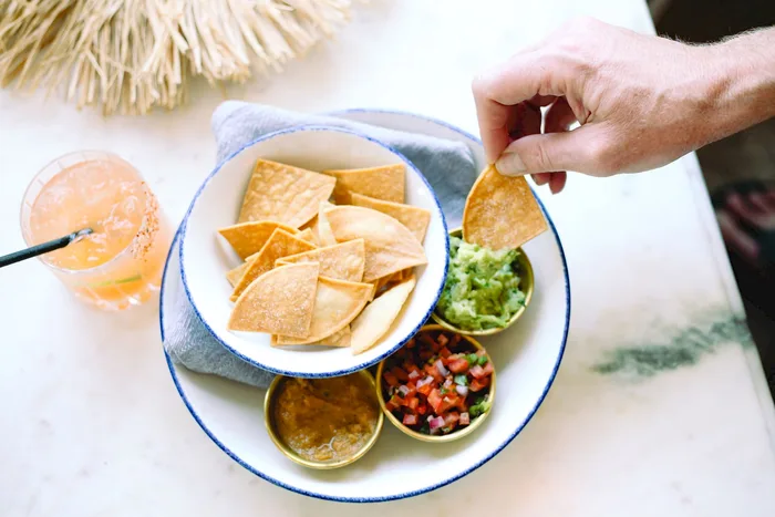 Chips, salsa and guacamole served at Alteño
