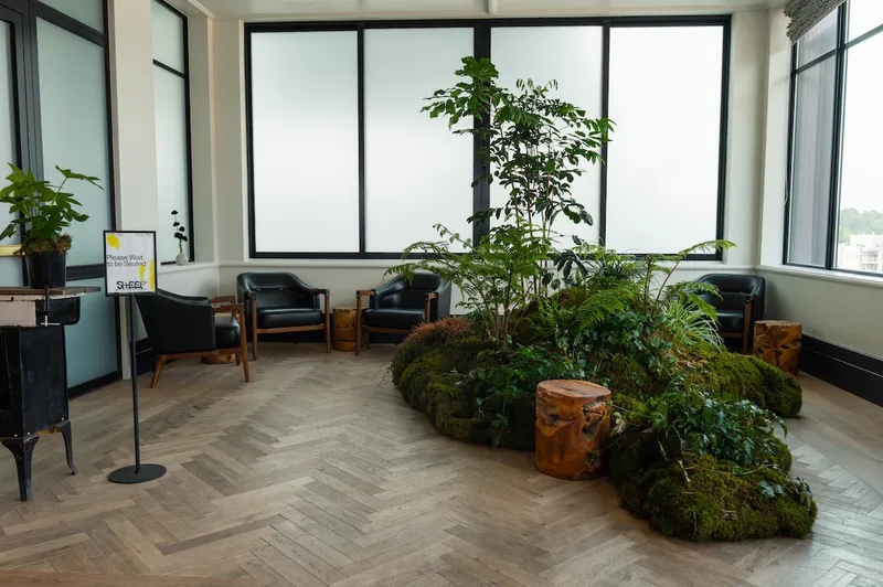 Moss and tree installation in the Clayton rooftop lobby leading to Sheep